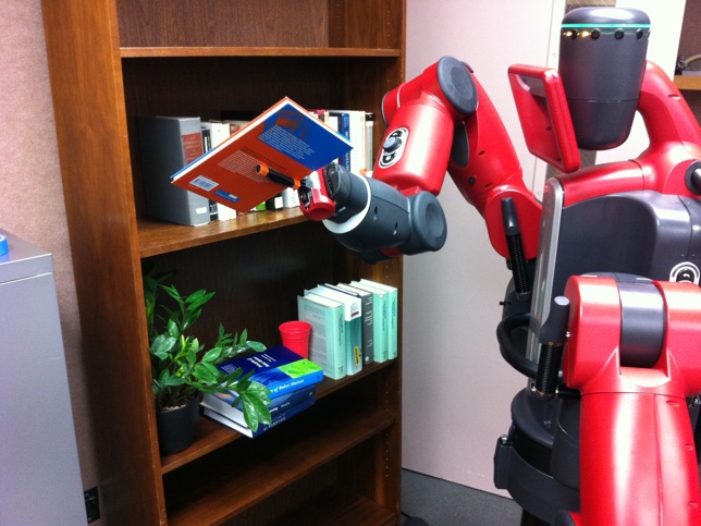 The Baxter robot uses fast parallel and cache-aware motion planners to move a book on a shelf.