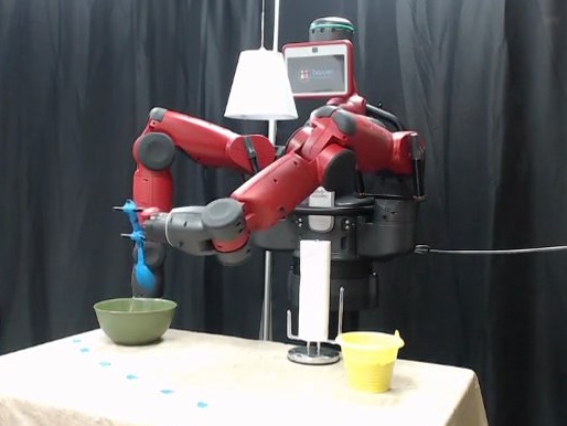The Baxter robot learns to use a spoon to transfer powder.